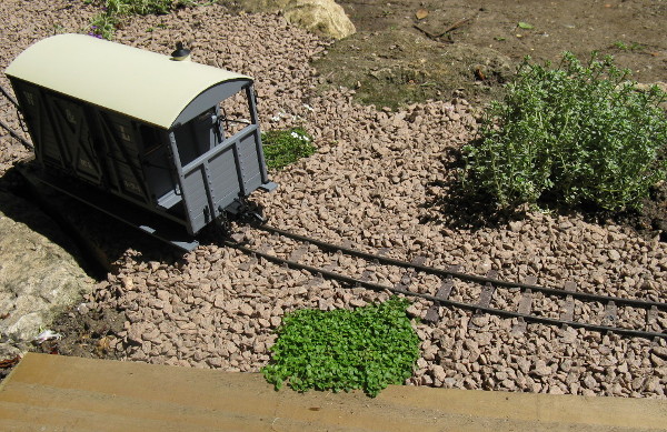 Garden railway ballasted with horticultural grit