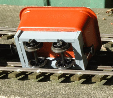 A Simple wagon made of plastic butter tub