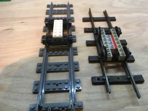 Left: Lego train wheels on Lego track. Right: SM32 chassis in Lego